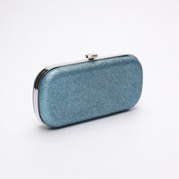 Side view of Shimmer Bella Clutch in Ocean Blue with silver clasp.