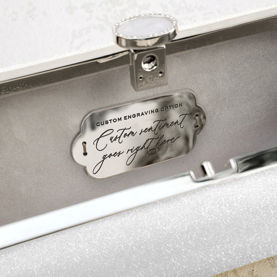 a Snow White Shimmer Bella Clutch from The Bella Rosa Collection with a message on it.